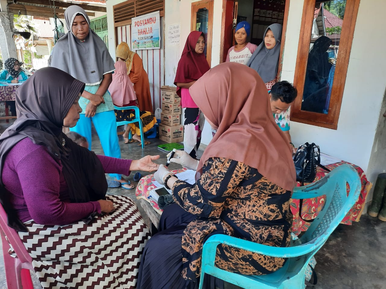 Kegiatan PTM di Posyandu Dahlia Kampung Tarok, Lakitan. Puskesmas Kambang